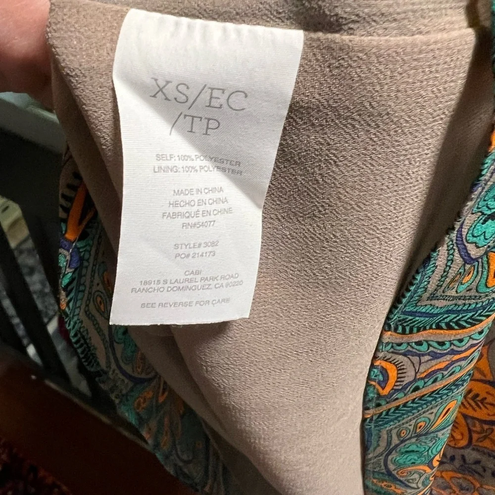 NWOT CAbi Floral Orange and Gray Lined Top Size XS